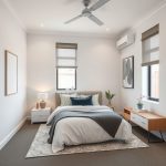 Modern Two-Bedroom Investment Property in Perth, showcasing sleek, pristine interiors with crisp lines and neutral tones,, set against a clear Perth skyline, perfect for construction projects and home painting contractors.