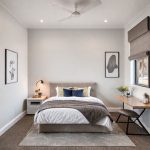 Modern Perth bedroom with vibrant painting, clean lines, and sleek design, showcasing Perth's modern art scene. Empty, professional, 16:9 aspect ratio, perfect for hospitality or modern home interiors.